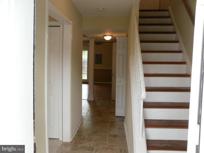 9349 Taney Road Manassas, VA 20110 - Photo 4 of 19 Designer tile entry,hall,kitchen, half ba.,dining.