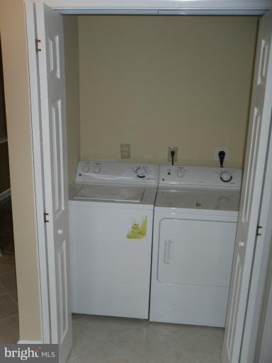 9349 Taney Road Manassas, VA 20110 - Photo 9 of 19 Handy full size laundry off of kitchen.
