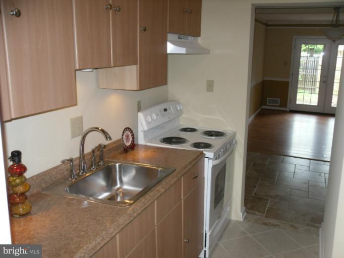 9349 Taney Road Manassas, VA 20110 - Photo 10 of 19 New electric range and hood.