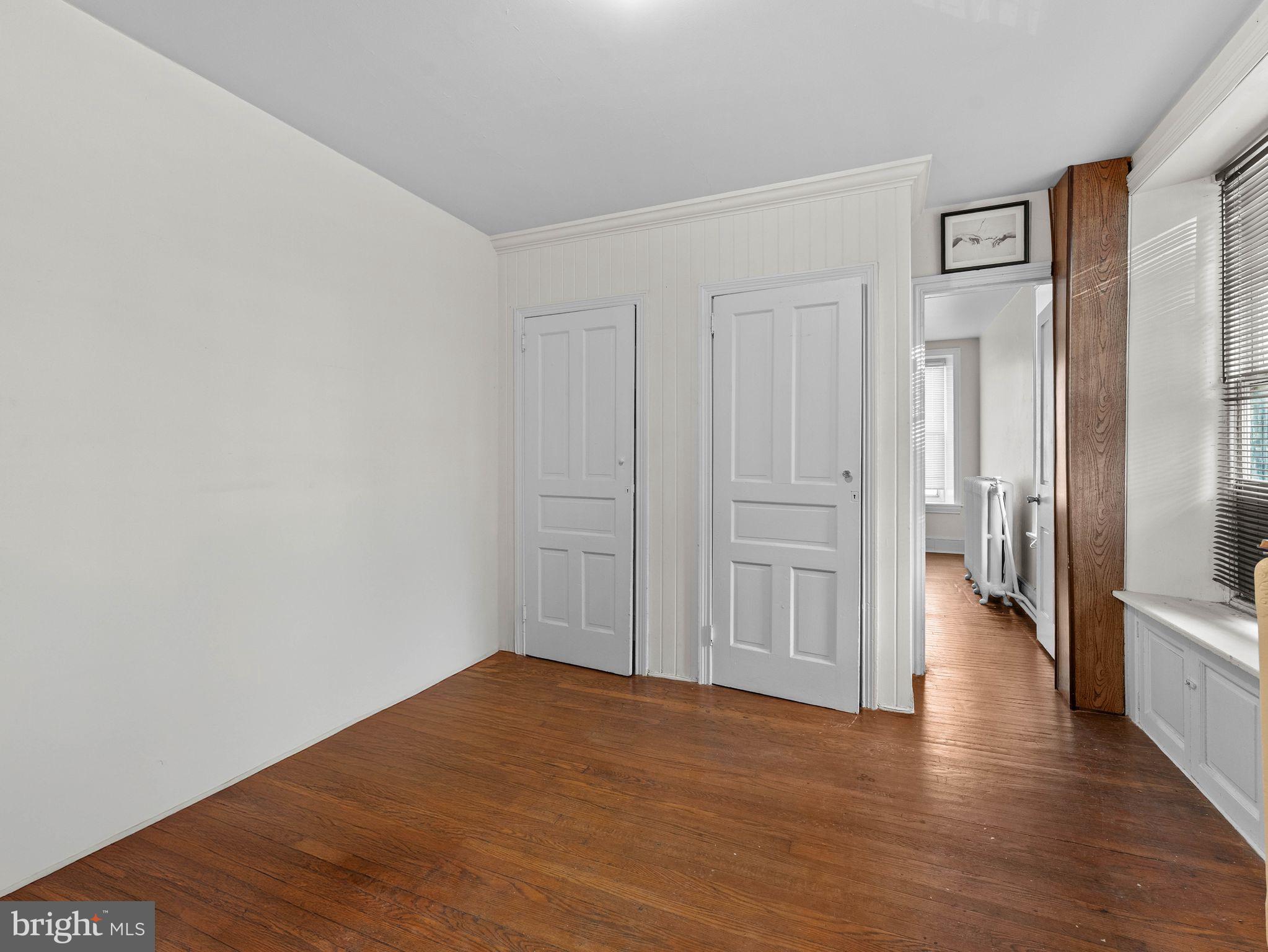 149 Herman Street Philadelphia, PA 19144 - Photo 13 of 35 a view of a hallway with wooden floor