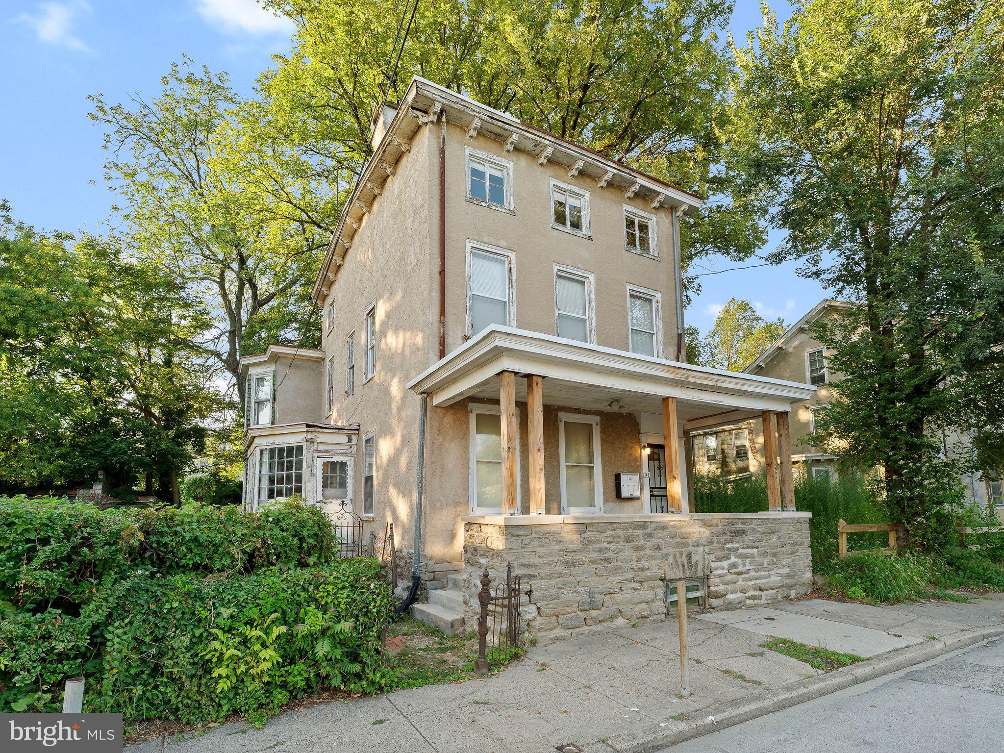 149 Herman Street Philadelphia, PA 19144 - Photo 29 of 35 a front view of a house with a garden