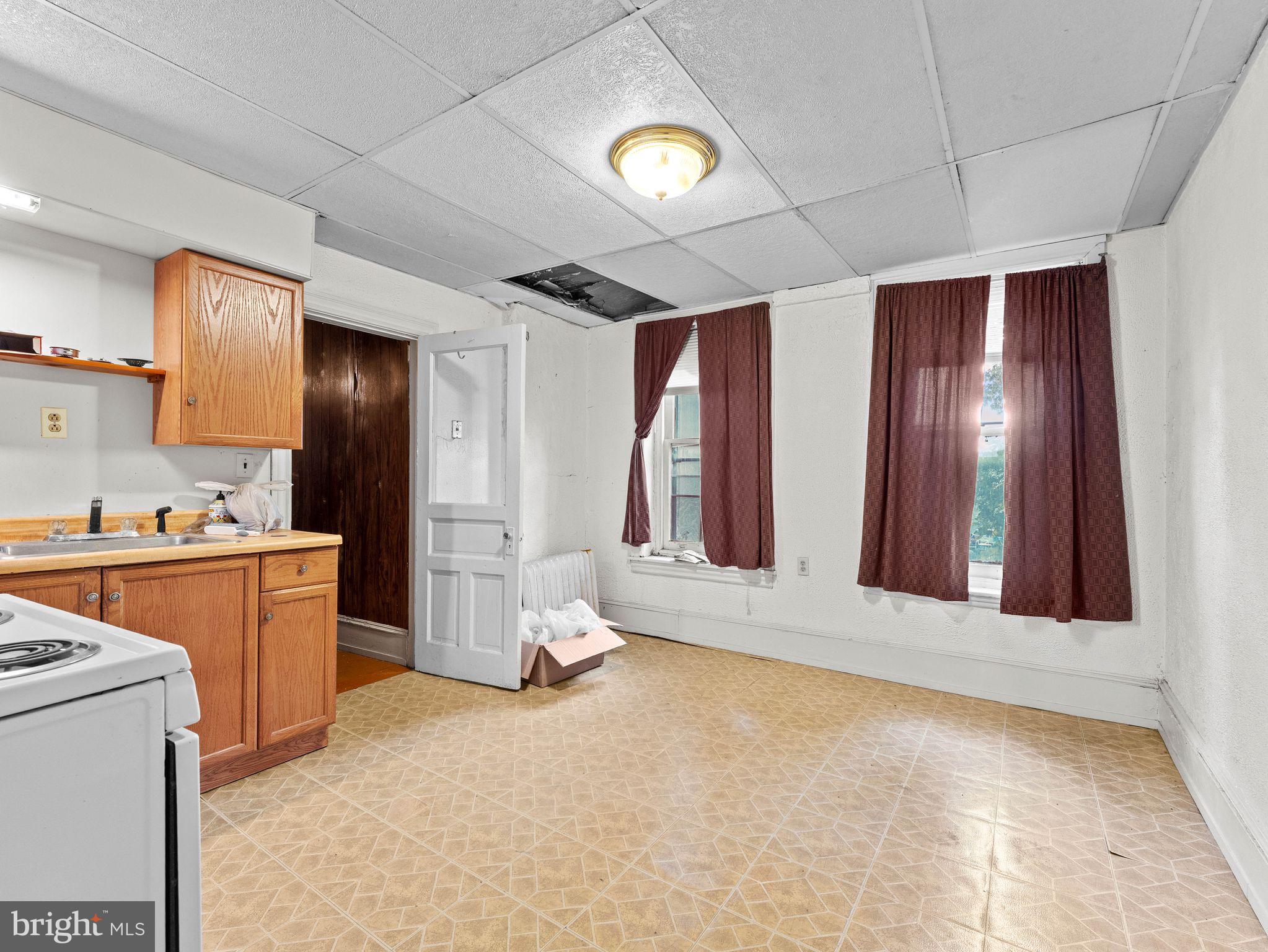 149 Herman Street Philadelphia, PA 19144 - Photo 31 of 35 a view of an empty room with window and bathroom