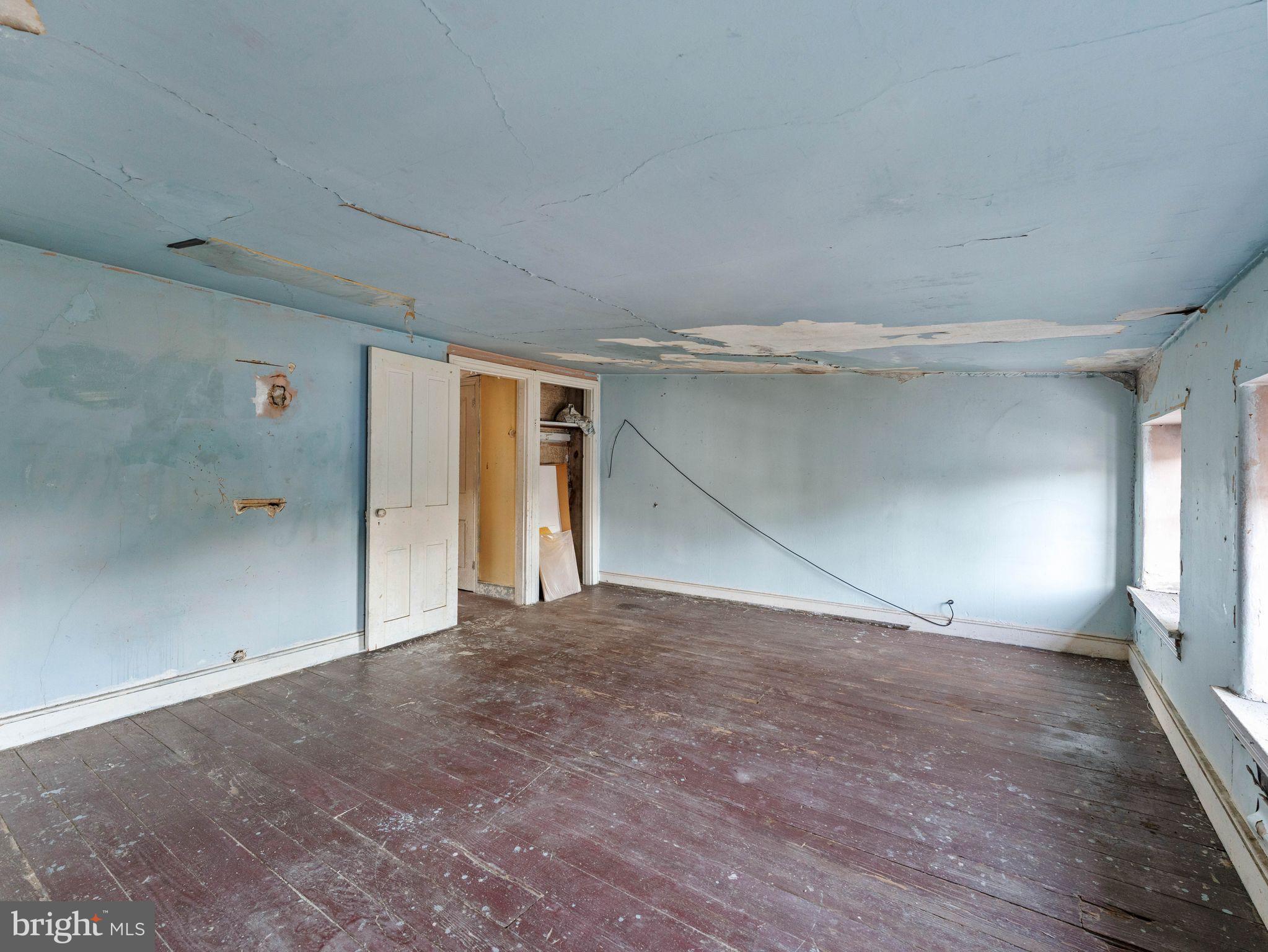 149 Herman Street Philadelphia, PA 19144 - Photo 34 of 35 a view of empty room with wooden floor
