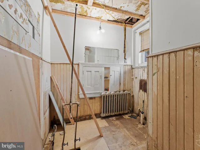 a view of an entryway with a door