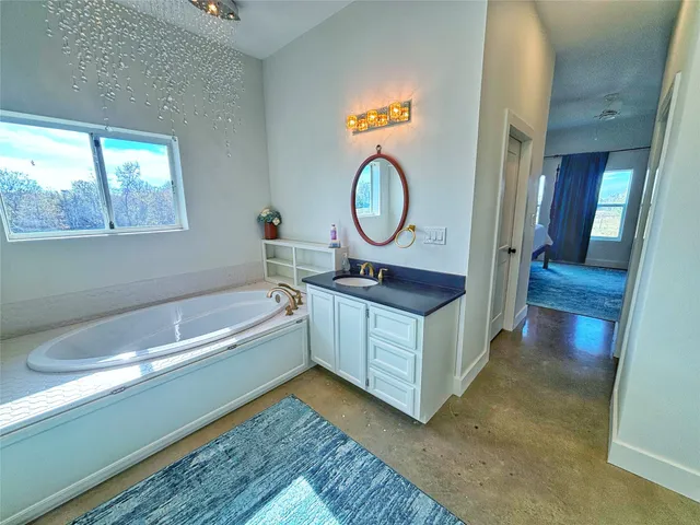 a bathroom with a sink and a bathtub