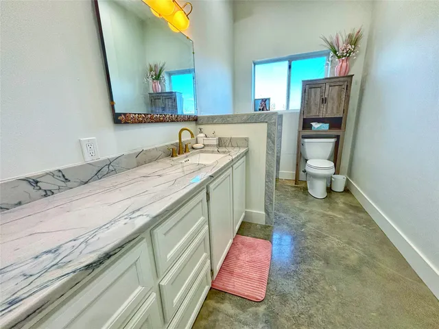 a view of an ocean and a mountain