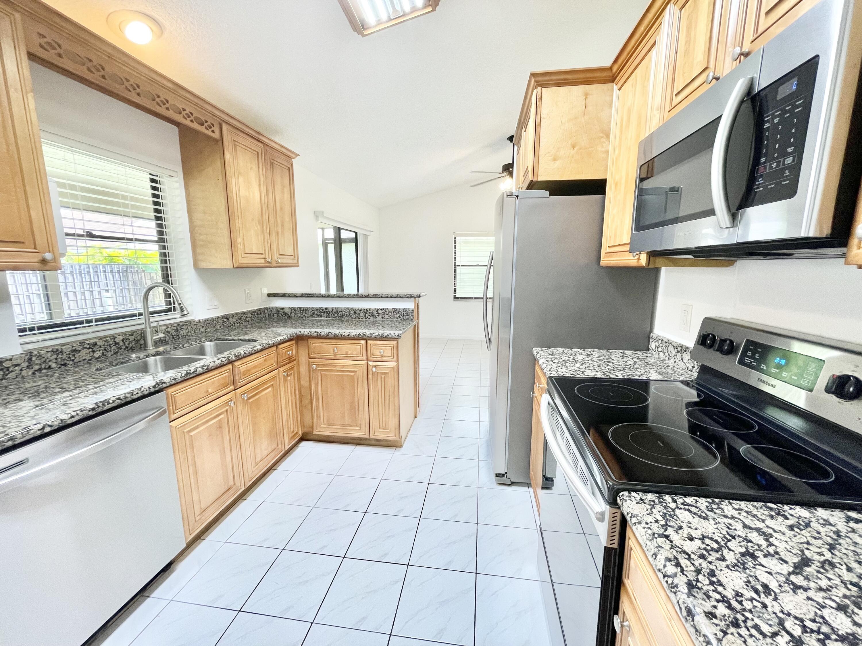 22550 Grouper Court Boca Raton, FL 33428 - Photo 12 of 20 Open Granite Kitchen