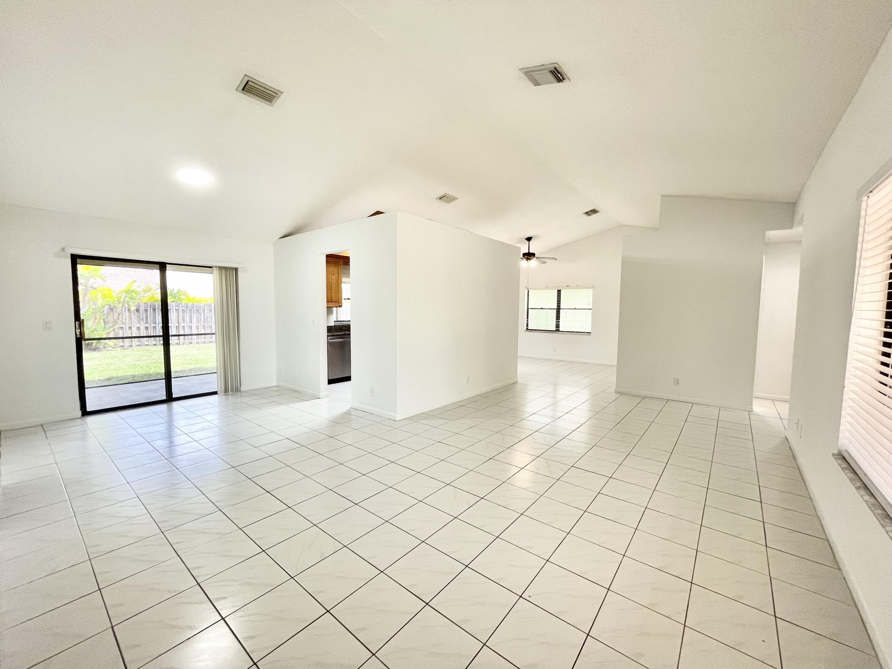 22550 Grouper Court Boca Raton, FL 33428 - Photo 6 of 20 Dining Room + Living Room