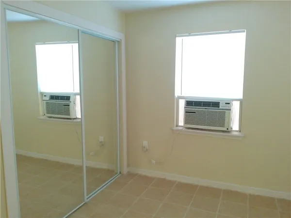 a bathroom that has a window in it