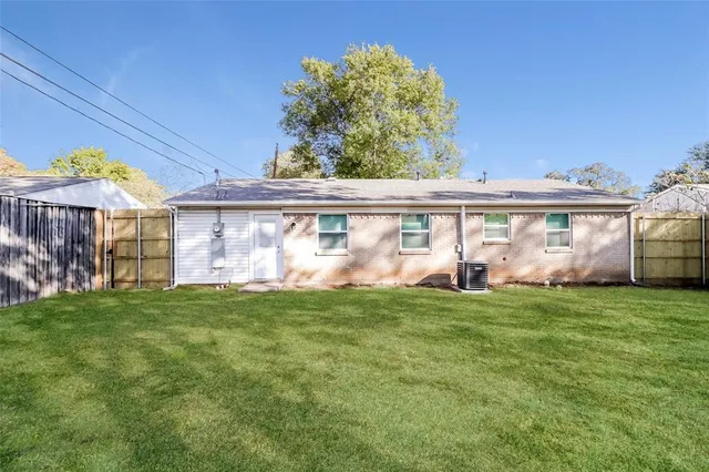 a view of a house with a garden