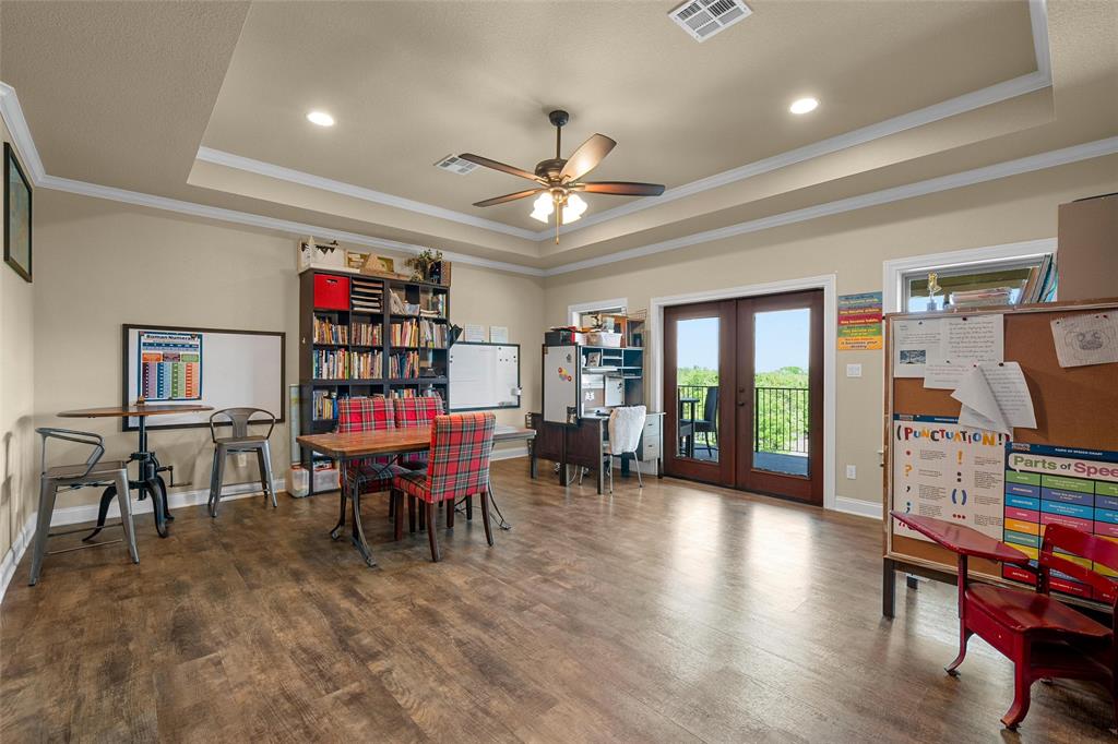 14690 Chapel Road Lorena, TX 76655 - Photo 25 of 40 a view of a livingroom with furniture and a chandelier
