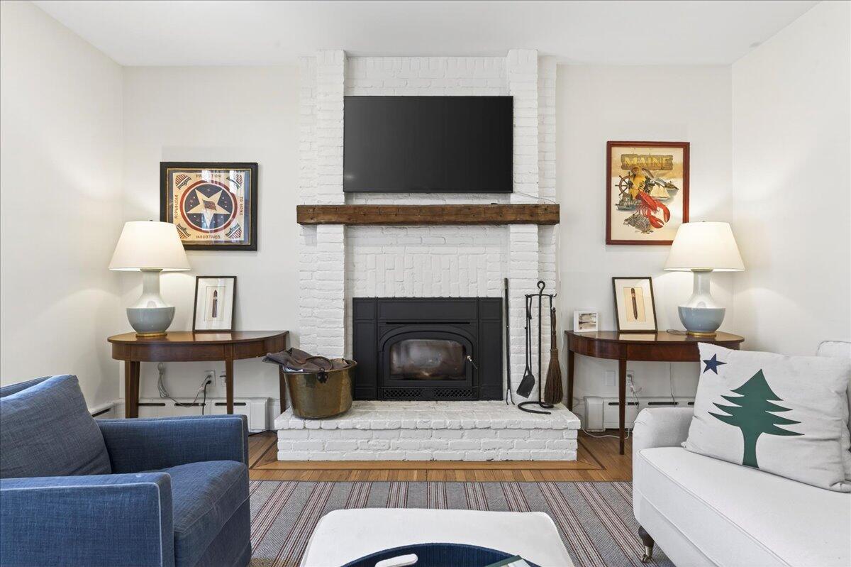 22 Royall Point Road Yarmouth, ME 04096 - Photo 34 of 109 Family room wood fireplace