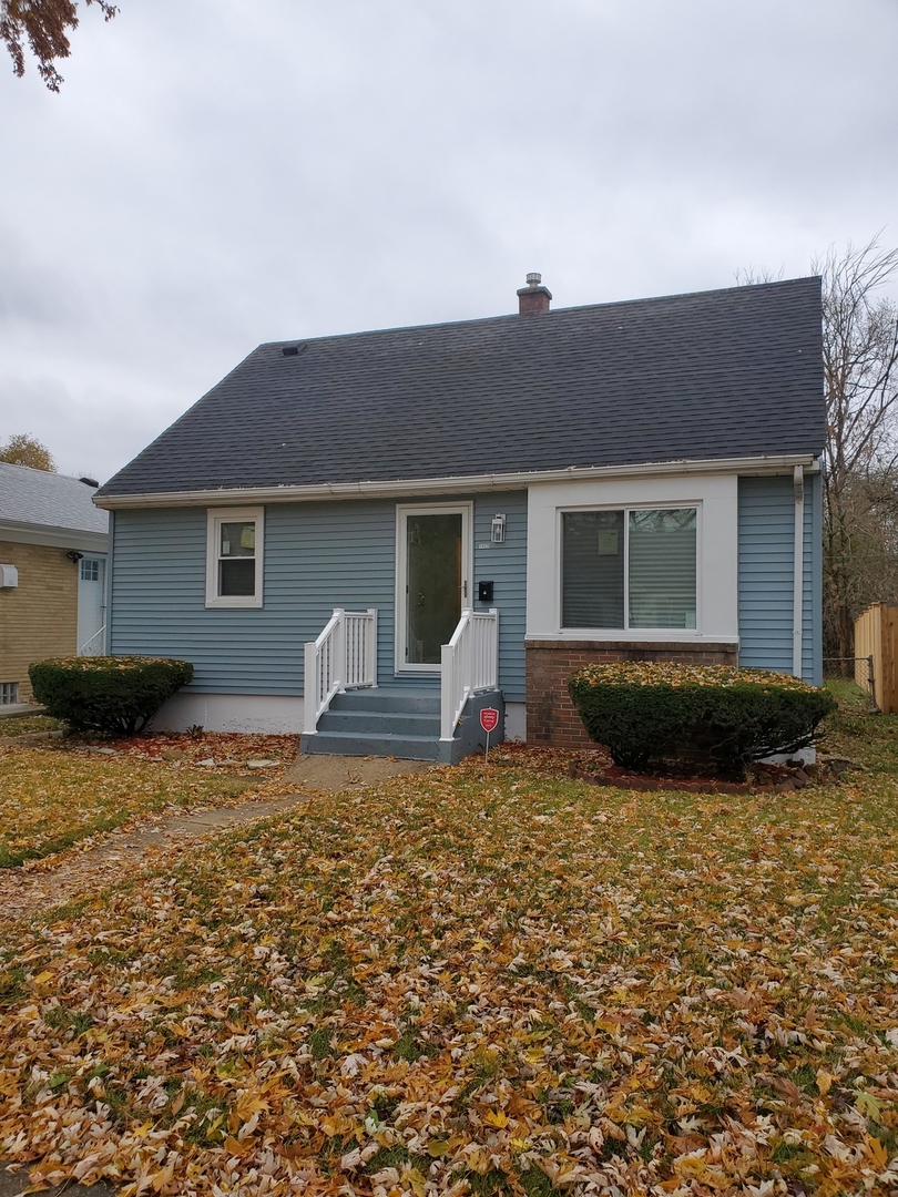 a house view with a garden space