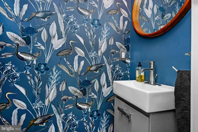 a view of a house with a table and chairs