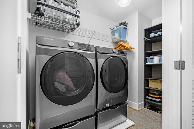a utility room with dryer and washer