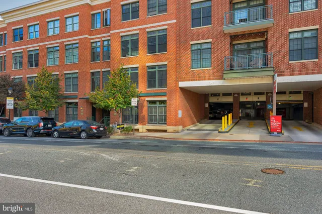 a view of a building with a street