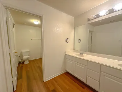 a living room with dryer and washer