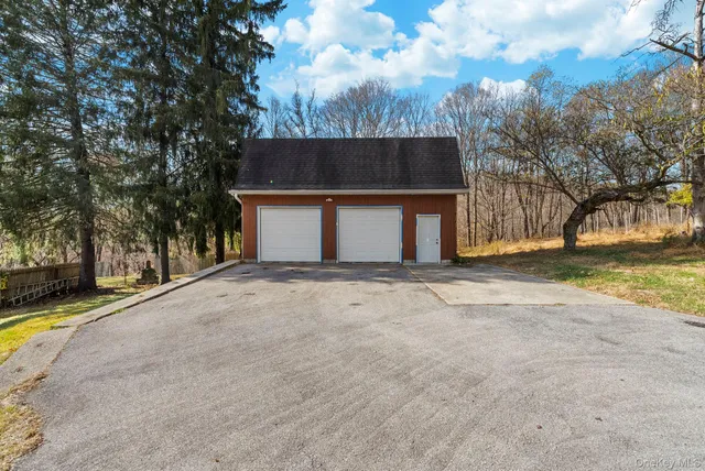 a view of a house with snow on the ground