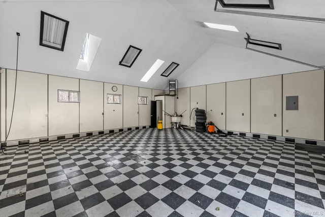 a view of parking garage with car parked