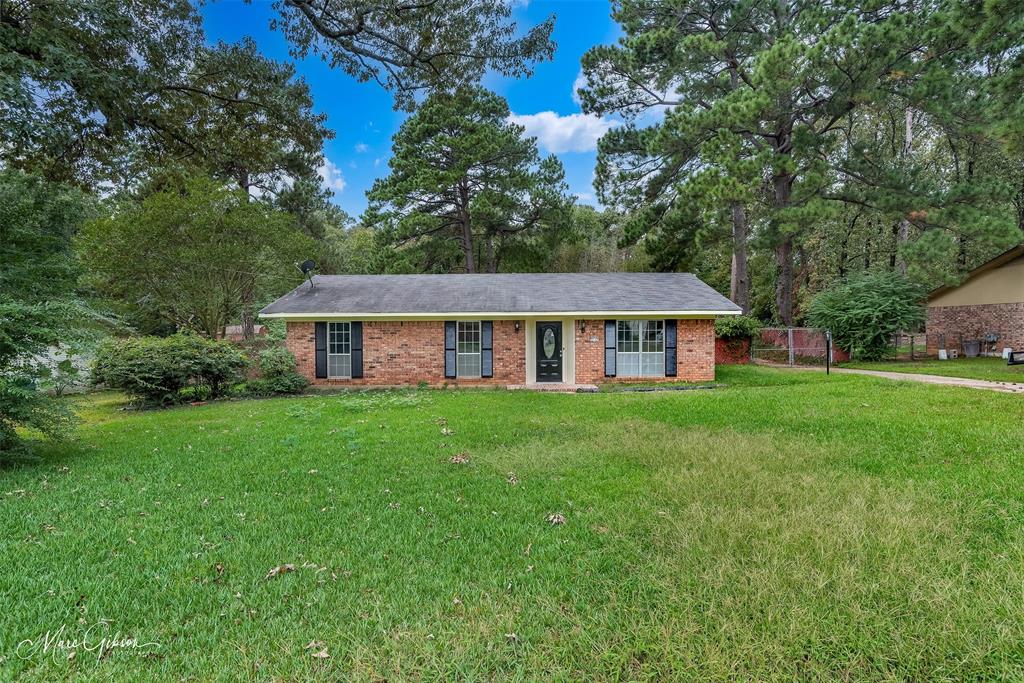 3112 Gorton Road Shreveport, LA 71119 - Photo 1 of 19 a front view of a house with yard and green space