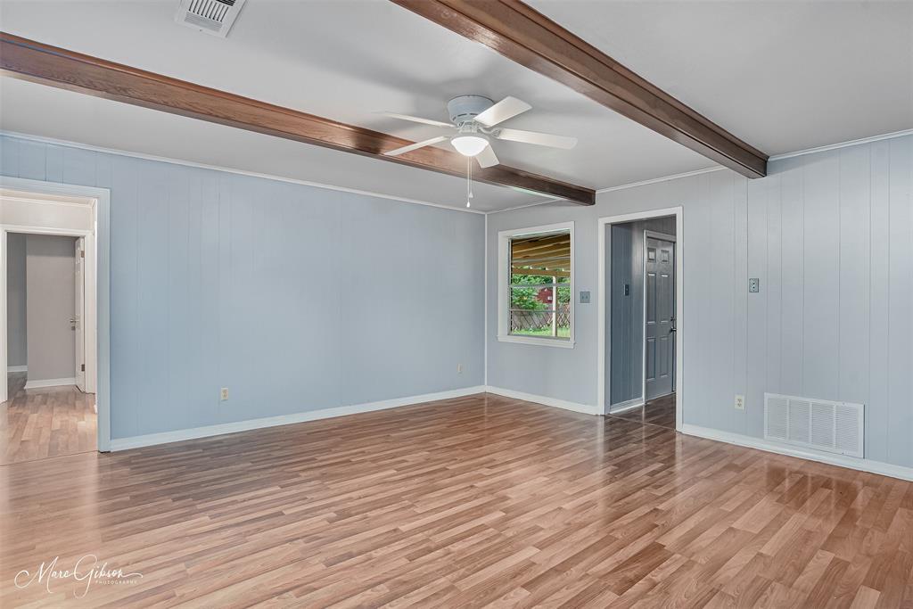 3112 Gorton Road Shreveport, LA 71119 - Photo 11 of 19 a view of an empty room with wooden floor and a window