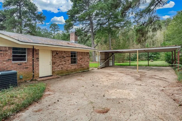 a view of backyard with green space