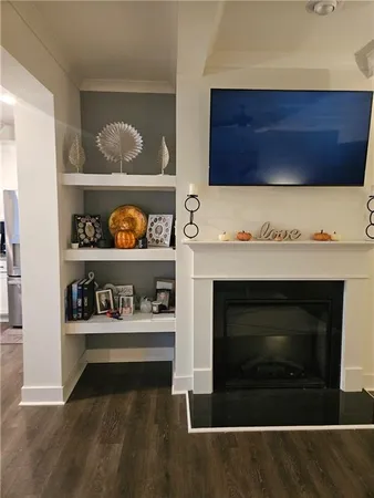 a stove top oven sitting inside of a kitchen