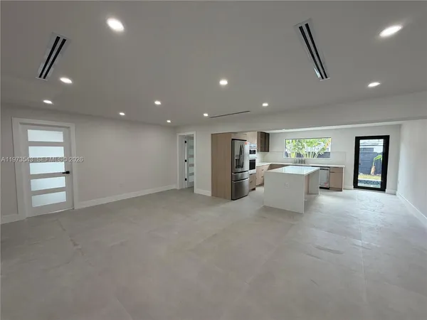 an empty room with windows