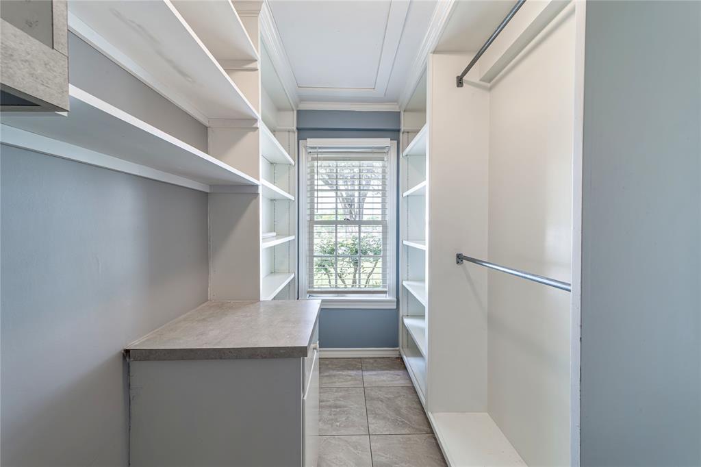 7302 Kenwell Street Dallas, TX 75209 - Photo 13 of 29 a view of an empty room with a window