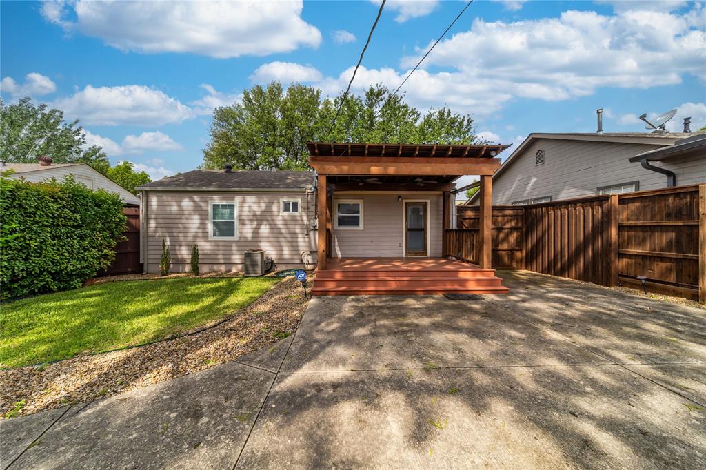 7302 Kenwell Street Dallas, TX 75209 - Photo 24 of 29 a view of a house with a yard and plants