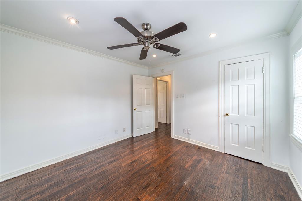 7302 Kenwell Street Dallas, TX 75209 - Photo 10 of 29 an a view of an empty room with wooden floor