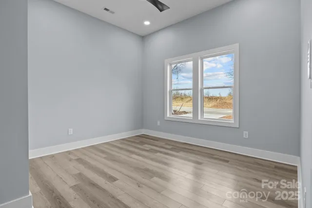 an empty room with windows