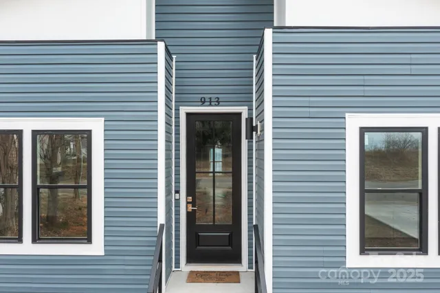 a view of a door and a window