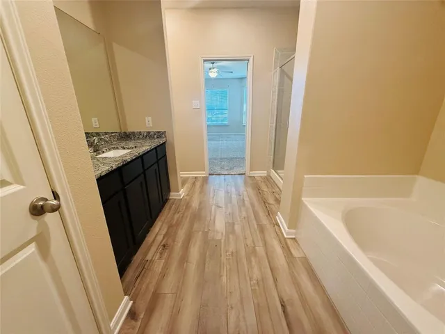 a bathroom with a sink a washer and dryer