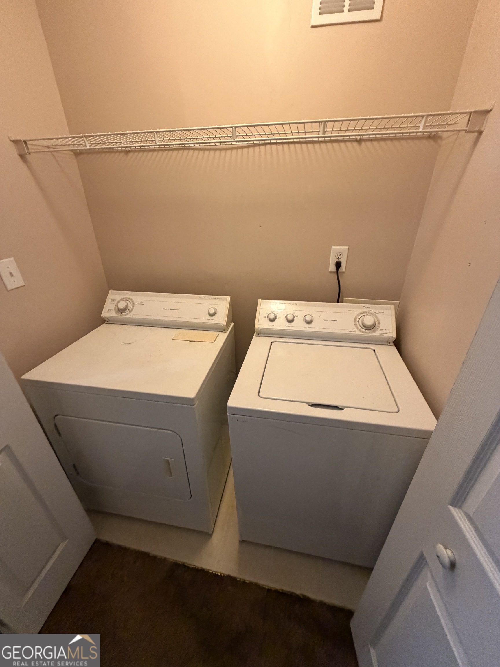 4951 Martin Farms Road Powder Springs, GA 30127 - Photo 7 of 9 a utility room with dryer and washer