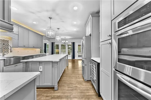 a large kitchen with a large counter top