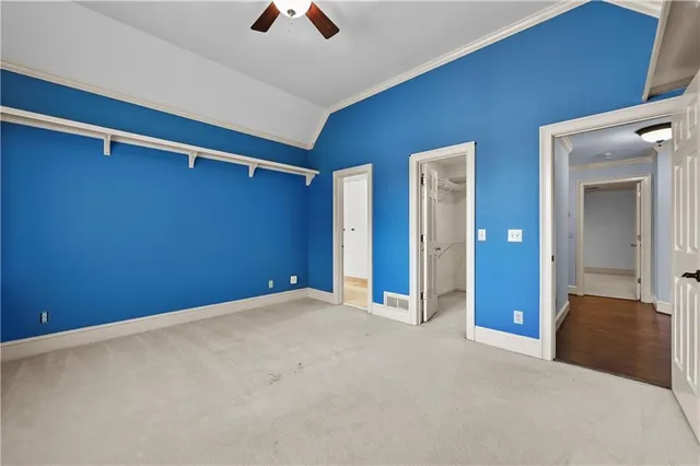 a view of a kitchen with wooden floor