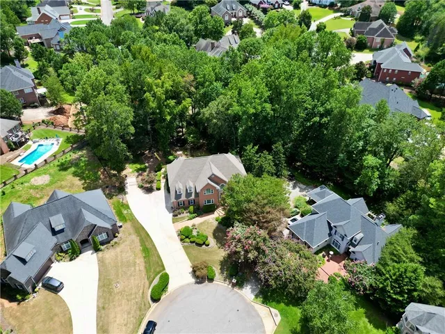 an aerial view of residential house with outdoor space