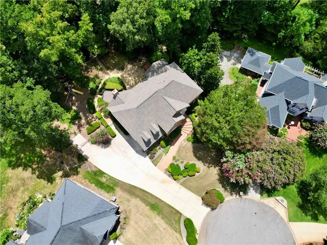 an aerial view of a house with a garden