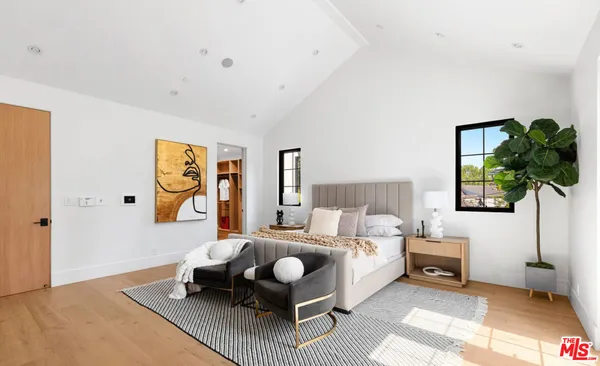 a bathroom with 2 sink and a mirror