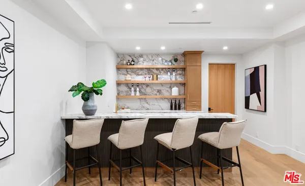 a terrace with a bench