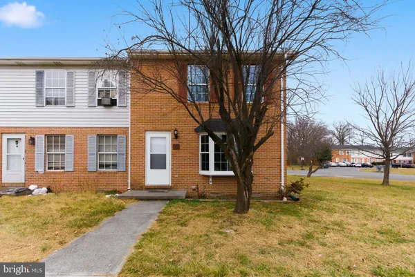a front view of house with yard