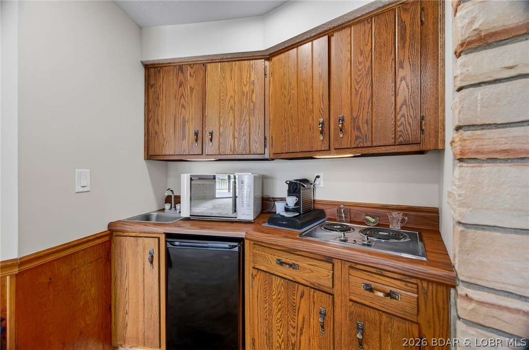 2293 Standing Rock Road Camdenton, MO 65020 - Photo 52 of 99 Lower-Level Family Rooms Built-in Coffee Bar Area.
