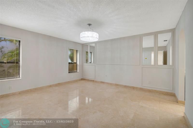 9268 Sable Ridge Circle, Unit C Boca Raton, FL 33428 - Photo 23 of 50 a view of an empty room with a window