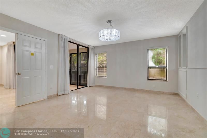 9268 Sable Ridge Circle, Unit C Boca Raton, FL 33428 - Photo 24 of 50 a view of an empty room with a window