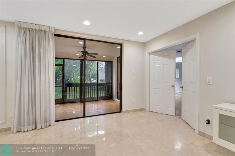 9268 Sable Ridge Circle, Unit C Boca Raton, FL 33428 - Photo 3 of 50 a view of a big room with windows and entryway