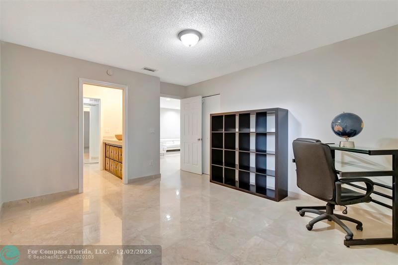 9268 Sable Ridge Circle, Unit C Boca Raton, FL 33428 - Photo 32 of 50 a view of a workspace with furniture and a window