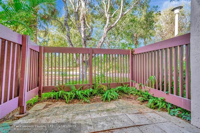 9268 Sable Ridge Circle, Unit C Boca Raton, FL 33428 - Photo 39 of 50 a front view of a house having yard