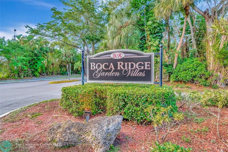 9268 Sable Ridge Circle, Unit C Boca Raton, FL 33428 - Photo 50 of 50 a sign that is sitting on a brick wall