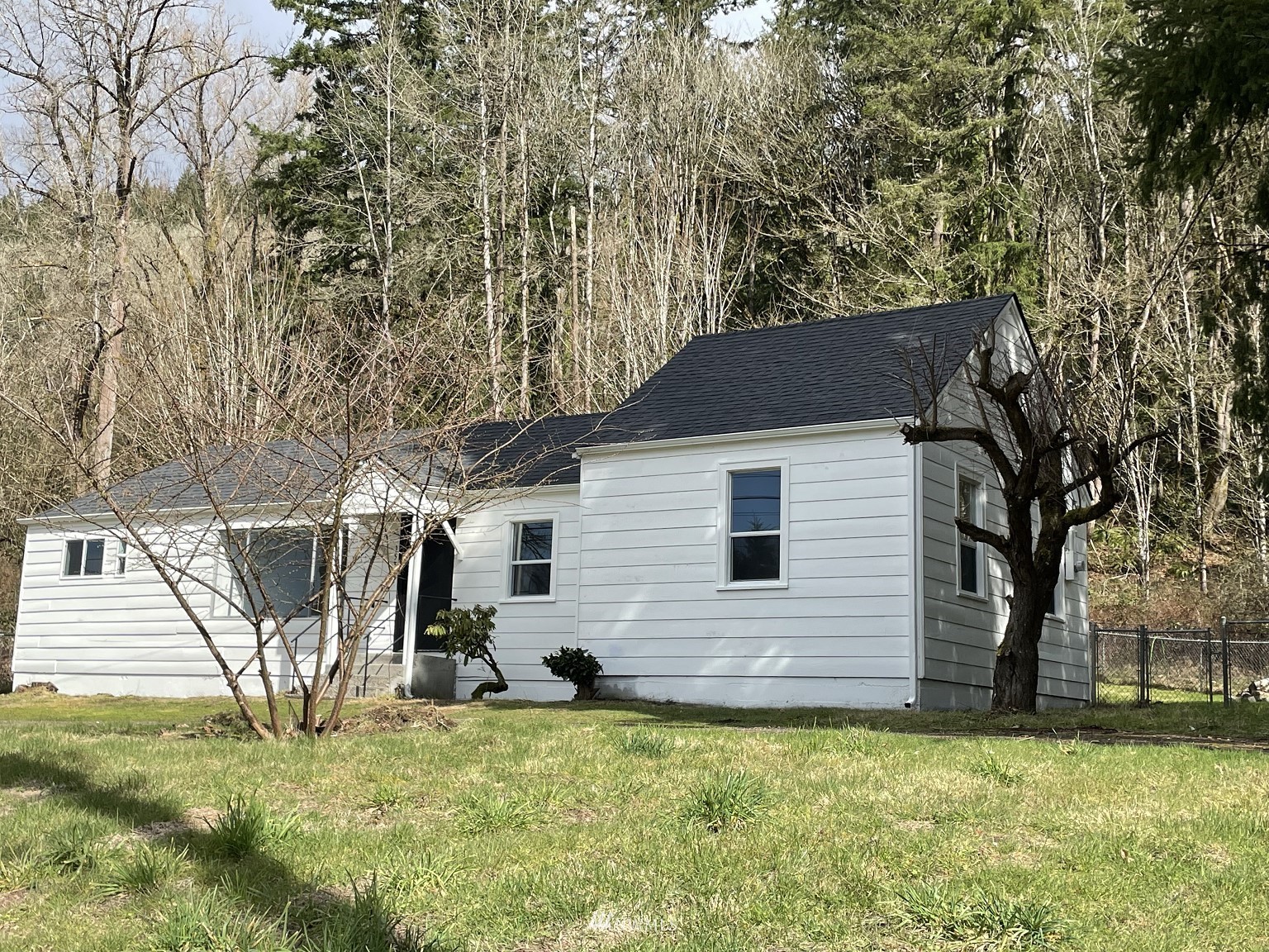 15346 Southeast May Valley Road Renton, WA 98059 - Photo 24 of 26 a view of a house with a yard